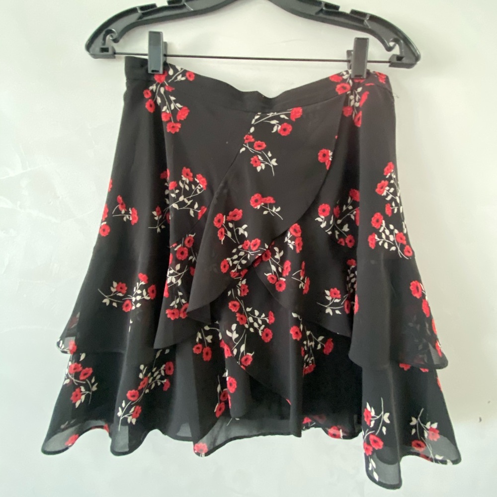 Bardot Black Ruffle Mini Skirt with Red Flowers.